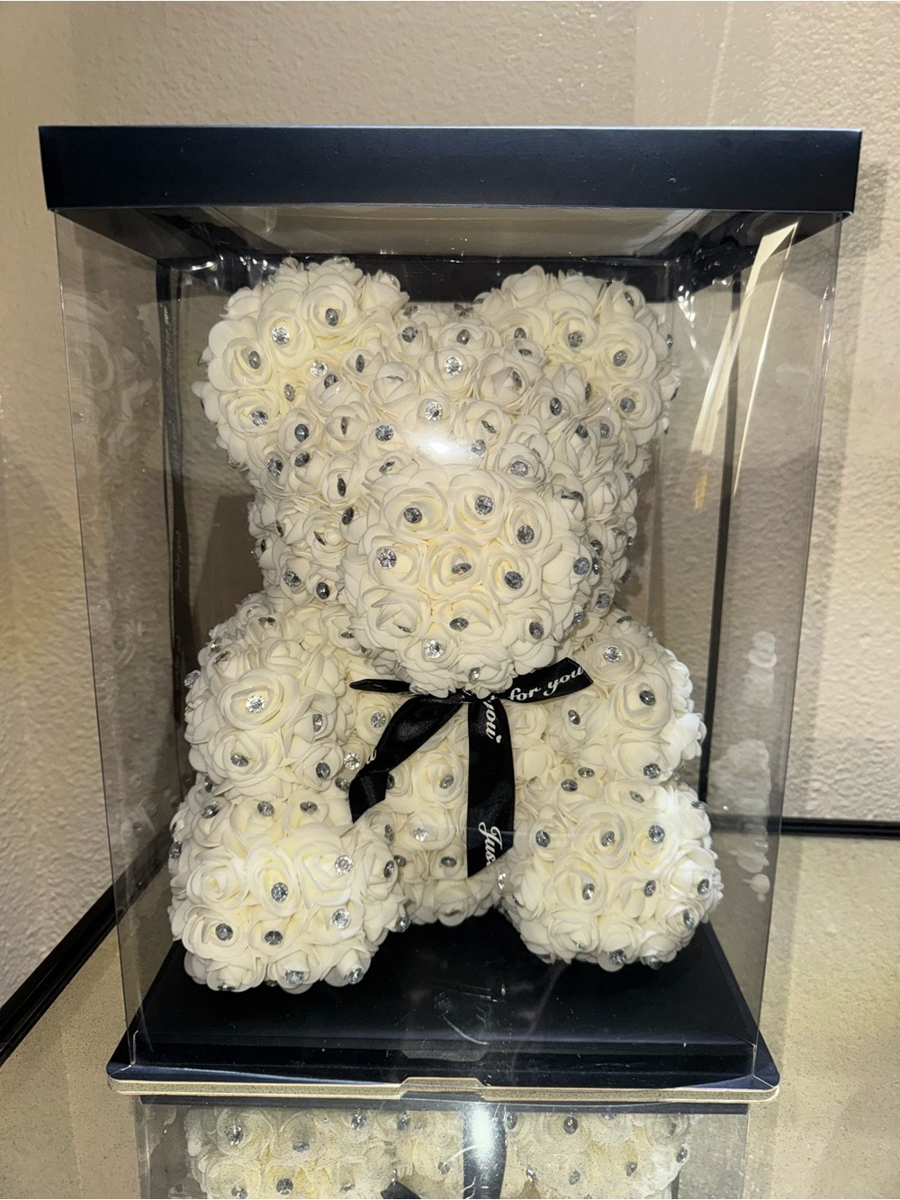 decorative white artificial rose teddy bear adorned with rhinestones
